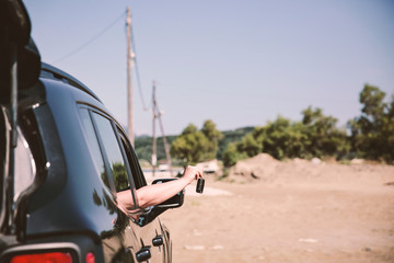 Summer car and woman with hat . 