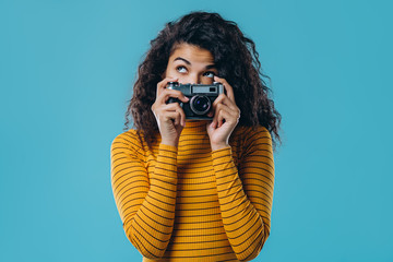 African american woman isolated on blue background.