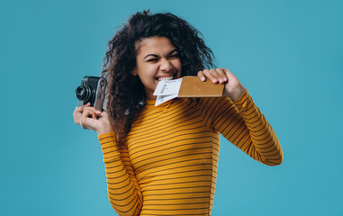 African american woman isolated on blue background.