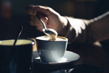Close up of cappuccino on table.