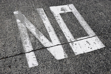 Fototapeta premium Painted word NO on concrete