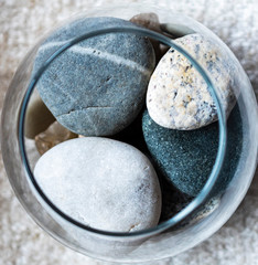 stones in a glass jar