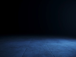 Empty blue spot lit dark concrete floor