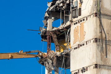 Demolition of a building with heavy equipment
