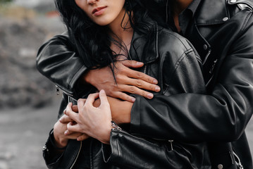 Hands of a couple in love close-up at sunset. Love.