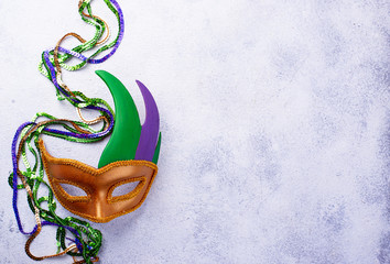 Mardi Gras background with carnival mask © Yulia Furman