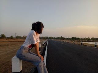 young woman on the road