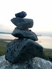 Photos of a stone pile laid on the side of the road