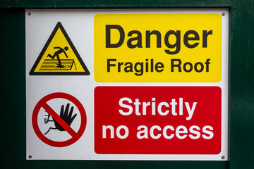 Danger fragile roof strictly no access sign