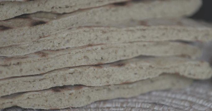 arabic barley flat bread, Flatbread homemade and fresh from the oven, Moroccan Pita Bread (Batbout), berber bread (toghrift ntomzine), Arabic bread cut and ready to use