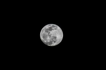 Full Snow moon in night sky