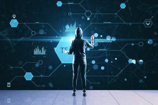 Hacker using glowing business data