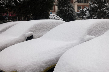 The heavy snow covered on the cars
