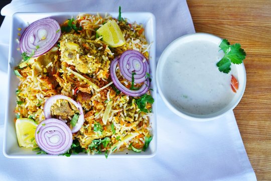 A dish of chicken and vegetable biryani at an Indian restaurant