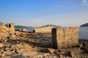 remain of ruins from stone mine in the beach in Lei Yue mon 