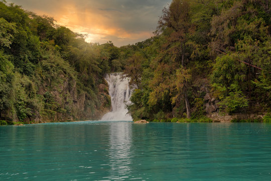 Amazing nature landscape, beautiful waterfall at sunrise, famous ,"el salto" san luis potosi Mexico, outdoor travel background