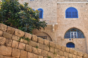 city scape stone buildings blue windows in Jaffa Israel