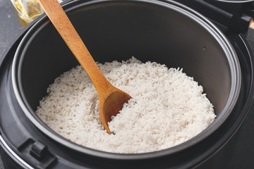 Multicooker with boiled rice, closeup