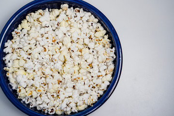 Popcorn in a blue bowl