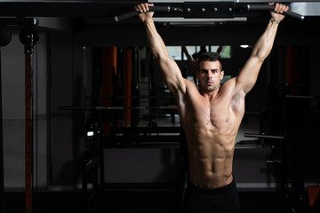 Male Athlete Doing Pull Ups