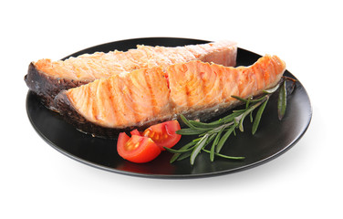 Plate with tasty cooked salmon on white background