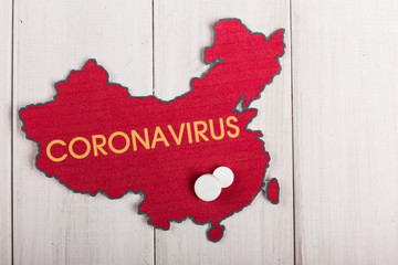 Concept of new chinese corona virus. Medicine equipment and pills