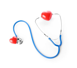 Stethoscope and hearts on white background. Cardiology concept