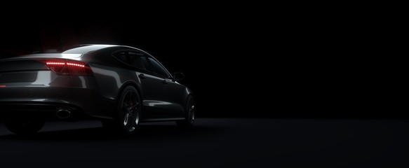 Black sports car on elegant dark background.