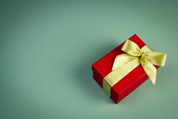 gift in a red festive box, holiday concept, place for your text