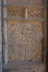 The decorations on the walls of ancient buildings