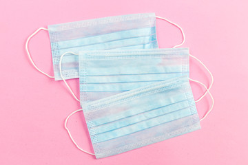 A close-up shot of a disposable surgical mask