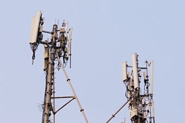a low angle view of a GPS antenna equipped with wireless technologies and associated with EMF pollution. Copy space as background