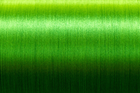 Closed up of green color of thread textured background