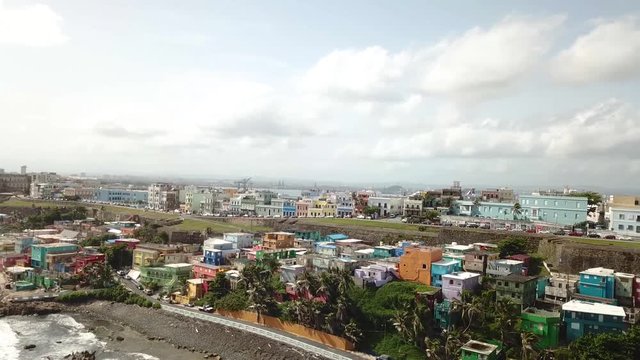 Vivid Cityscape of San Juan, Puerto Rico. Drone Aerial View of Colorful Houses in La Perla Neighborhood Under Beautiful Sky