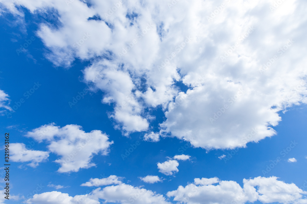 Wall mural Blue sky background with clouds sunny day