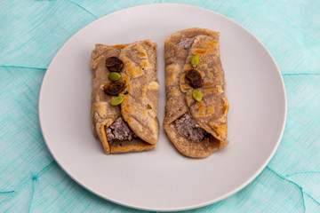 Fried Sorghum pancake with red bean which is called susu bukkumi in Korea