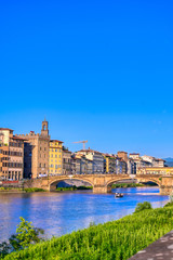 A view of the Arno River towards the Ponte Vecchio in Florence, Italy.