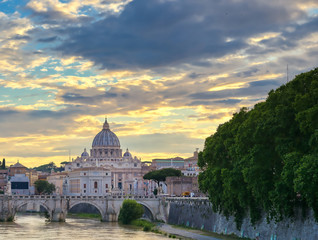 Fototapeta na wymiar A view along the Tiber River towards Vatican City in Rome, Italy.