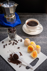 Fresh coffee brewed with moka pot, good coffee beans must have oil coated, coffee with delicious Chinese pastries