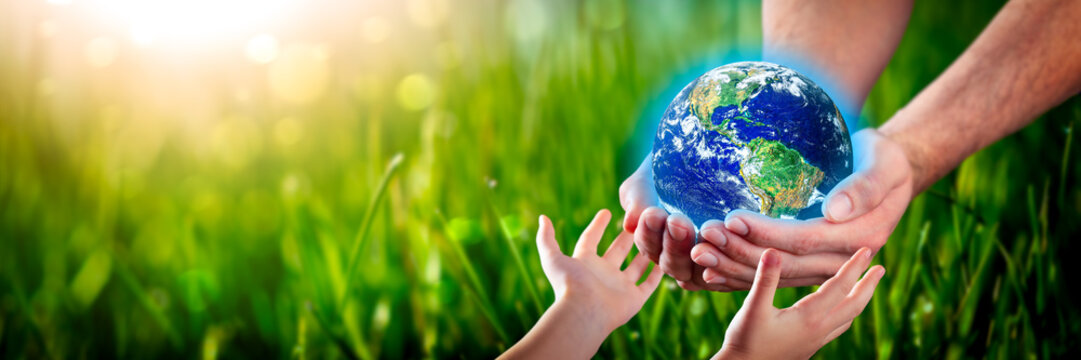 Hands Of Man Giving Earth To Child - Protect The Environment For Future Generations Concept - Some Elements Of This Image Provided By NASA