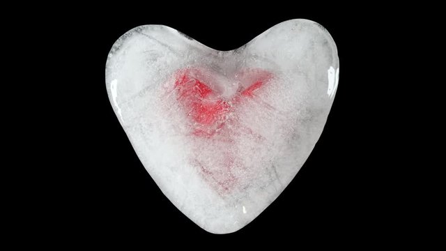 Frozen Heart, Ice melting, bleeding. Timelapse. Valentines Day. Alpha, 4K