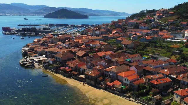 View on the beach and town of Combarro. Galicia, Spain. Drone Footage