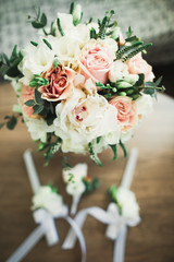 Beautiful wedding bouquet with different flowers, roses