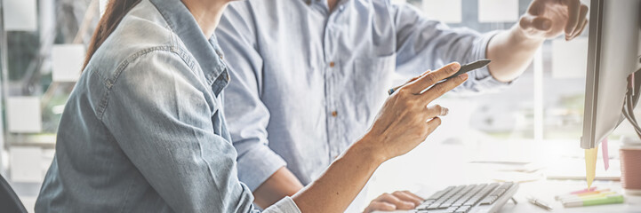 Graphic design and color swatches and pens on a desk. Architectural drawing with work tools and...