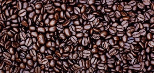 Coffee beans. Roasted coffee beans, can be used as a background. Coffee background close up.