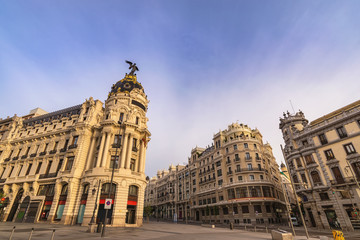 Fototapeta na wymiar Madrid Spain, city skyline at famous Gran Via shopping street