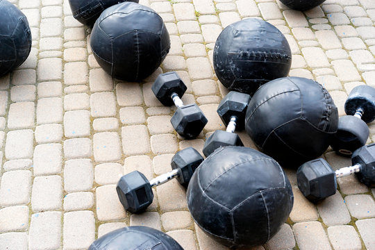 Medball, Slamball, Stuffed Ball,  Lying On The Floor With Dumbbells