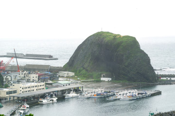 Utoro town with view spot Oronko rock tiny mountain.