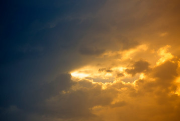 Sunlight shine out from colorful clouds background, Bahrain.
