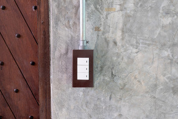 White light switch on loft style wall